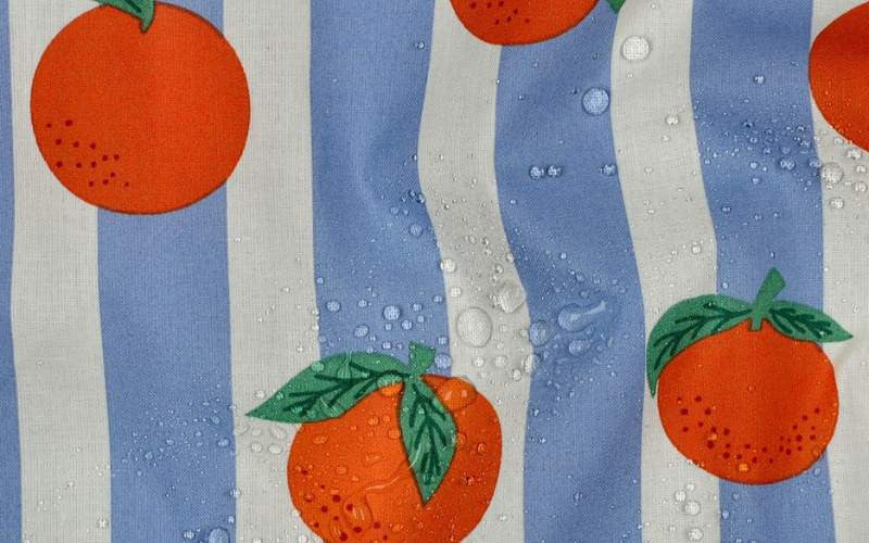 Tela impermeable Naranjas Azul